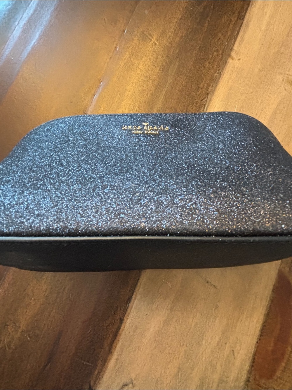 kate spade New York black glitter cosmetic pouch